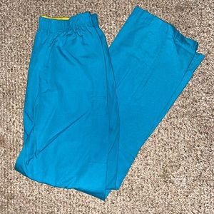 WonderWink scrub pants with slight wear. Stretchy waist. Straight leg fit.